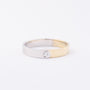 Wit/geel gouden ring met een briljant