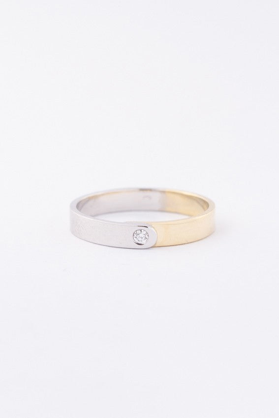 Wit/geel gouden ring met een briljant