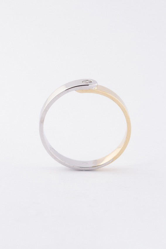 Wit/geel gouden ring met een briljant