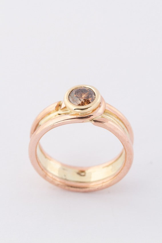 Rosé/geel gouden bi-color gouden ring met een bruine briljant