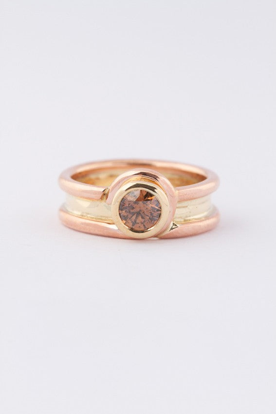 Rosé/geel gouden bi-color gouden ring met een bruine briljant