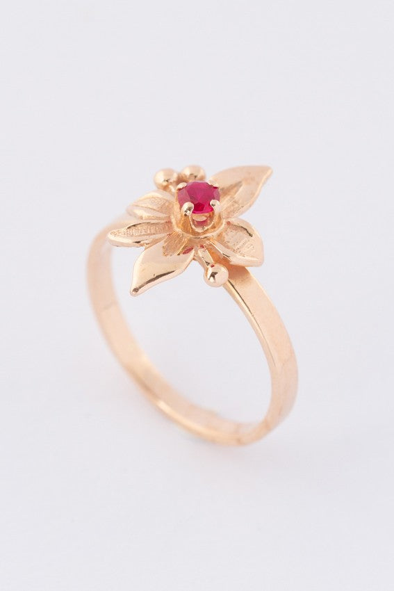 Gold ring with a ruby