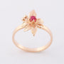 Gold ring with a ruby