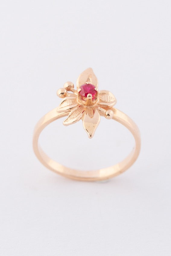 Gold ring with a ruby