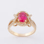 Gouden entourage ring met briljanten en robijnen