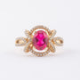 Gouden entourage ring met briljanten en robijnen