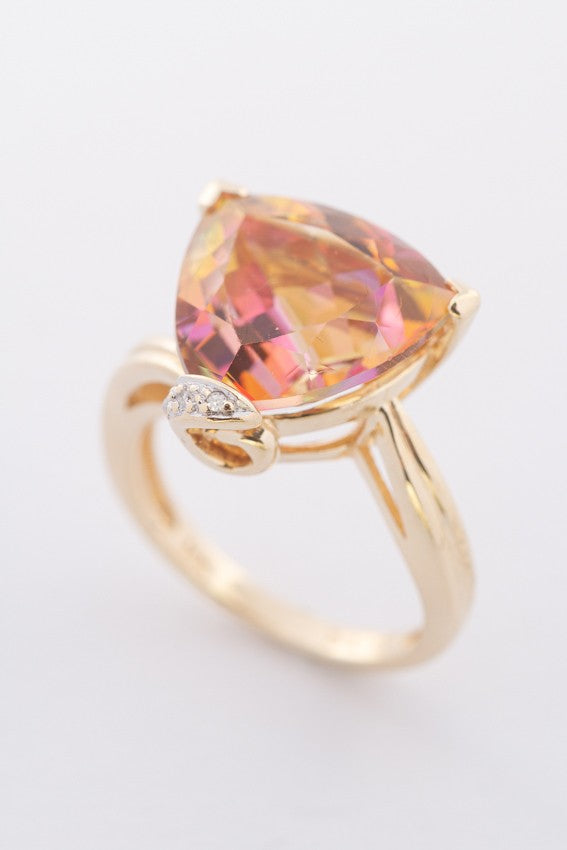 Gold ring with topaz and diamonds