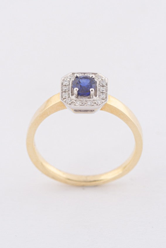 Gold ring with sapphire and diamonds