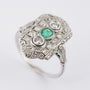 Antique platinum Art Deco ring with emerald