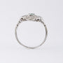 Antique platinum Art Deco ring with emerald