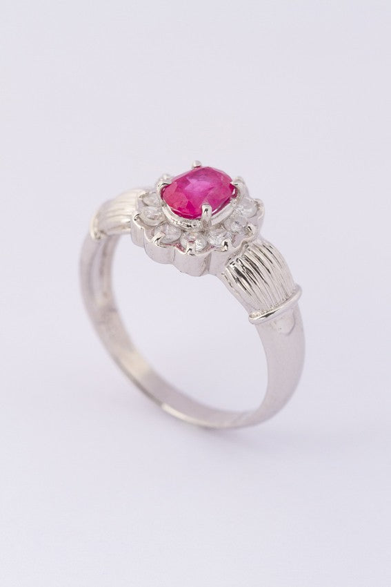 Platinum entourage ring with ruby