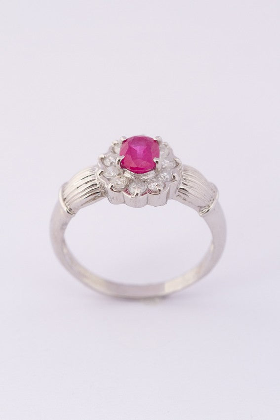 Platinum entourage ring with ruby