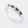 Row ring with sapphire and brilliant