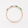 White gold row ring with emerald and brilliant