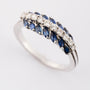 White gold row ring with sapphire