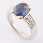 White/yellow gold ring with sapphire