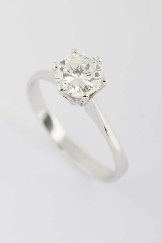 White gold solitaire ring with 1.07 ct brilliant cut diamond.