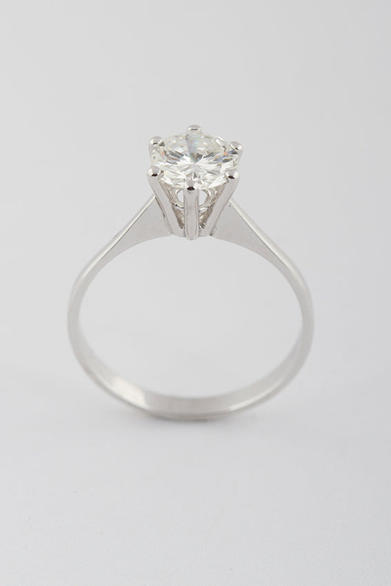 White gold solitaire ring with 1.07 ct brilliant cut diamond.