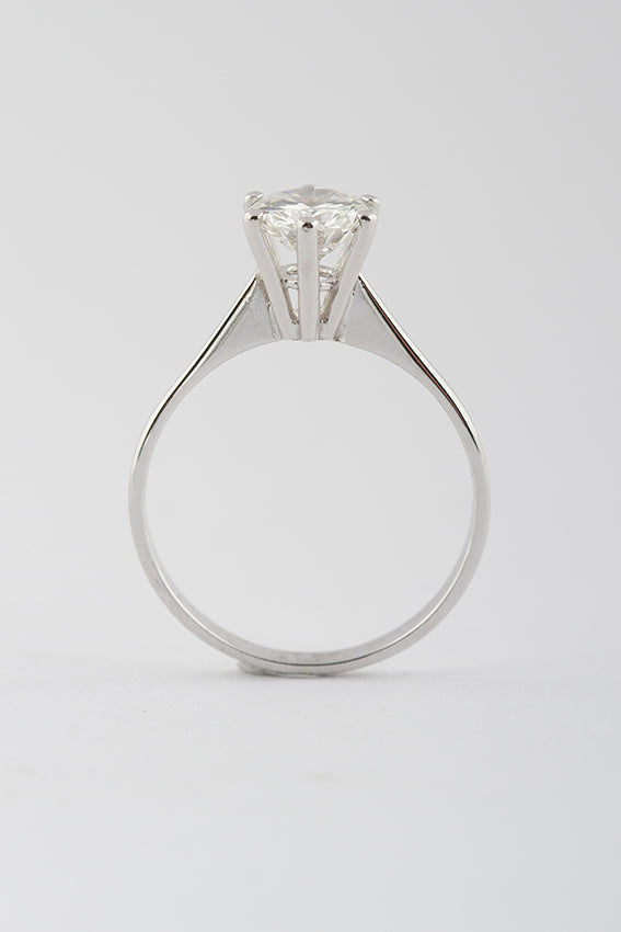 White gold solitaire ring with 1.07 ct brilliant cut diamond.