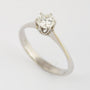 White gold solitaire ring with 0.60 ct brilliant cut diamond.