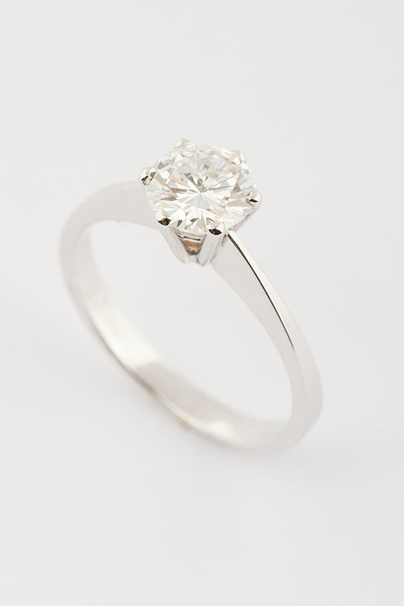 White gold solitaire ring with 0.98 ct brilliant cut diamond.