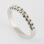 White gold row ring with 9 diamonds