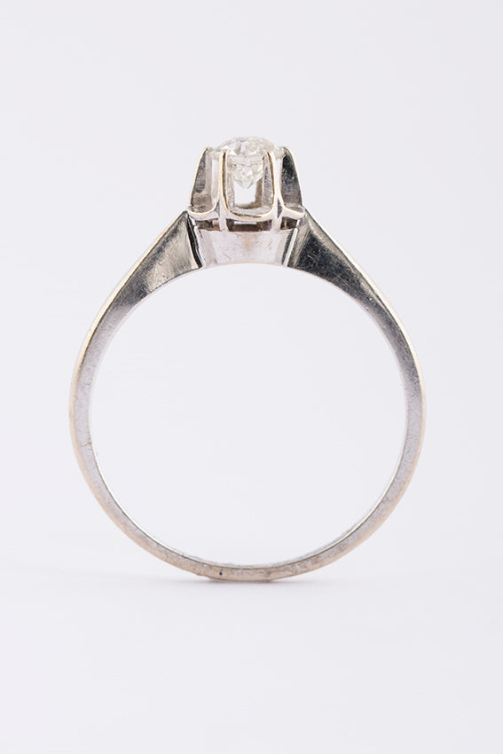 White gold solitaire ring with an old-cut brilliant