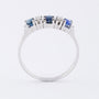 Row ring with sapphire and brilliant