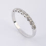 White gold row ring with diamond