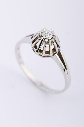 White gold solitaire ring with 0.18 ct brilliant cut diamond.