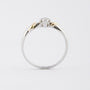 White/yellow gold solitaire ring with brilliant