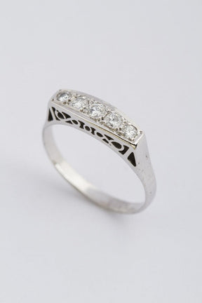 White gold row ring with diamonds
