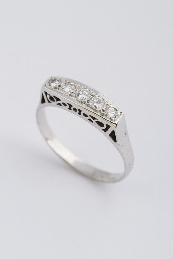 White gold row ring with diamonds