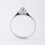 Wit gouden entourage ring met briljant en diamant