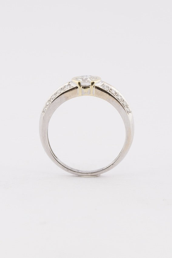 Wit/geel gouden band ring met briljanten