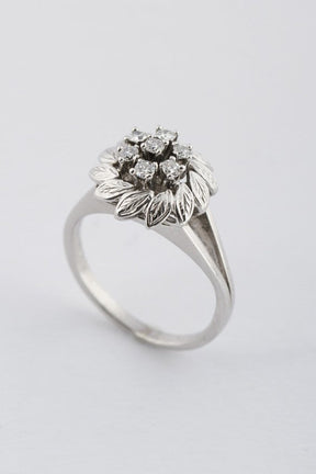 White gold entourage ring with diamonds