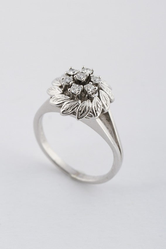 White gold entourage ring with diamonds