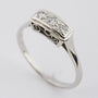 White gold row ring with diamonds