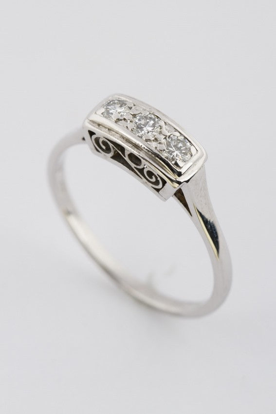 White gold row ring with diamonds
