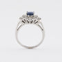 White gold entourage ring with sapphire and brilliant