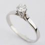 White gold solitaire ring with 0.63 ct brilliant cut diamond.