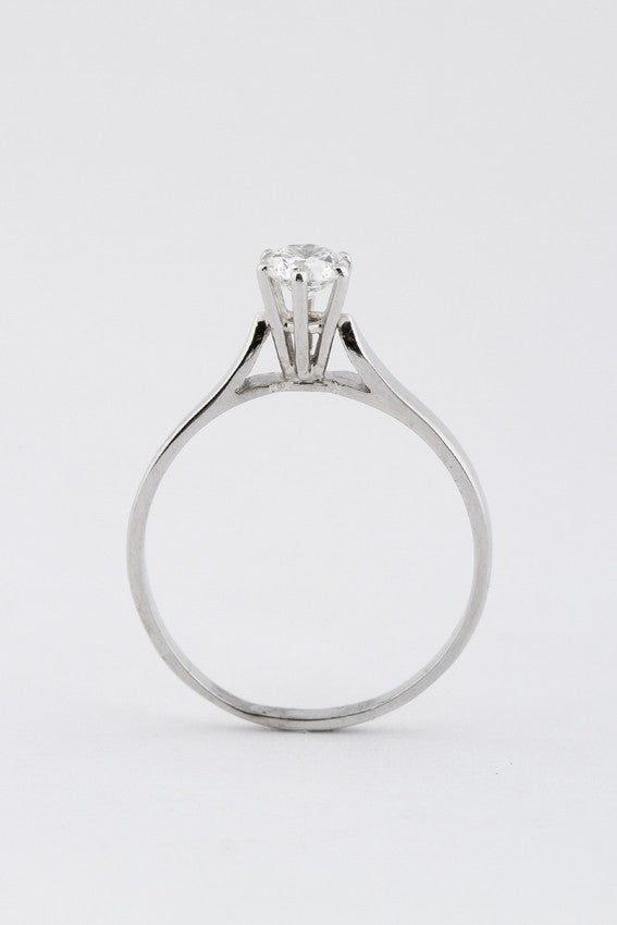White gold solitaire ring with 0.63 ct brilliant cut diamond.