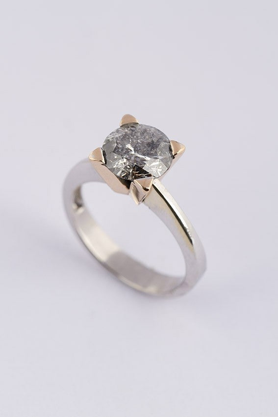 white/yellow gold solitaire ring with a 2.34 ct brilliant.