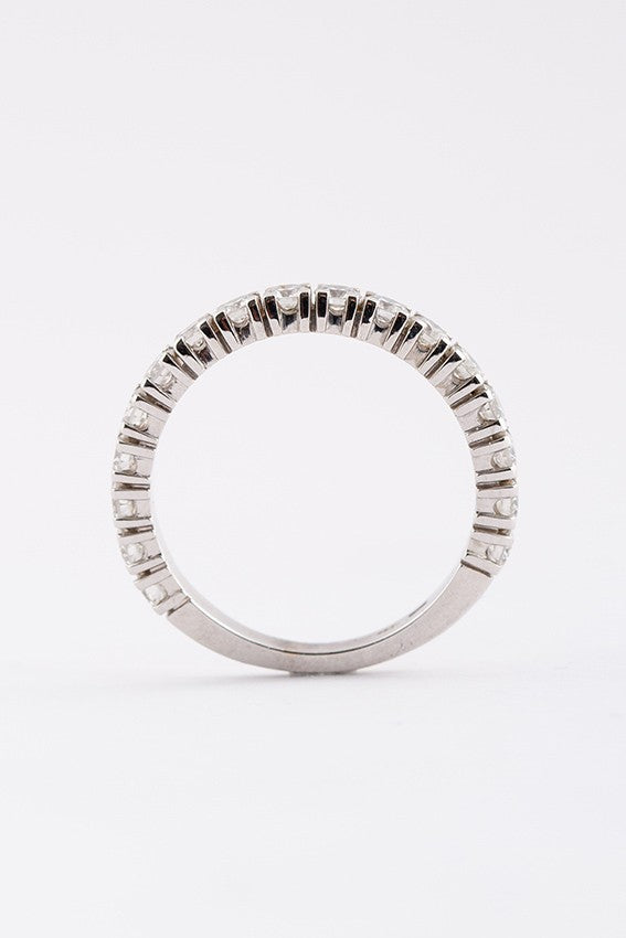 Gold half alliance ring with diamonds