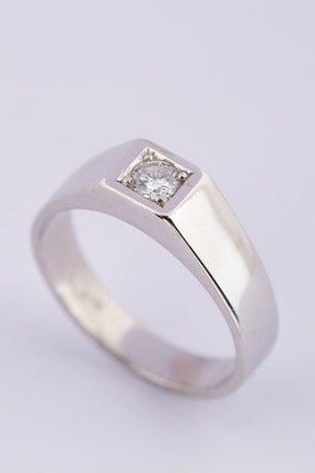 White gold men's ring with a brilliant
