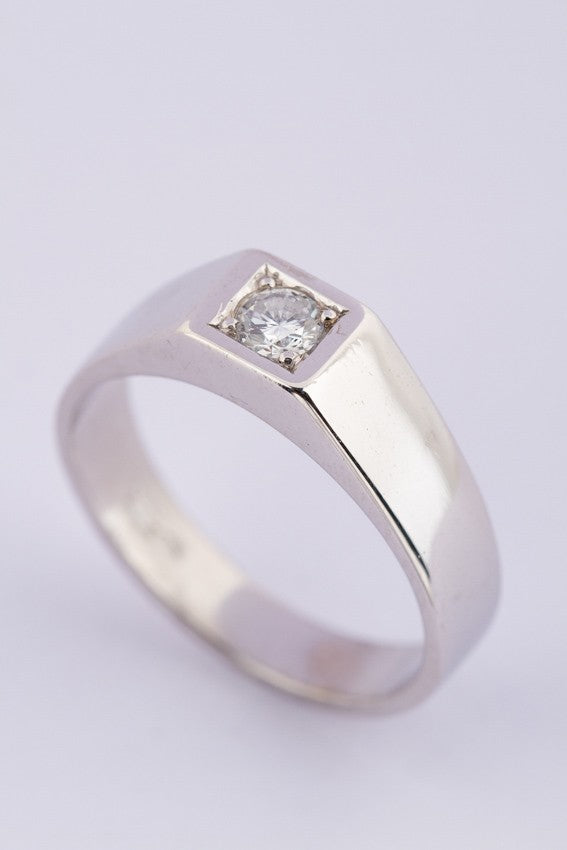 White gold men's ring with a brilliant