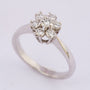 Wit gouden entourage ring 7 briljanten