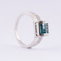 Wit gouden draaibare ring met blauwe en witte diamanten