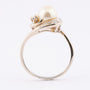 White gold ring with pearl and brilliant