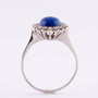 Wit gouden entourage ring met lapis lazuli en diamanten